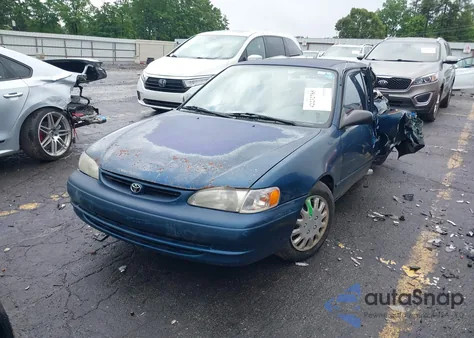 1999 Toyota Corolla Ce z USA, uszkodzony, nr VIN 1NXBR12E8XZ298678